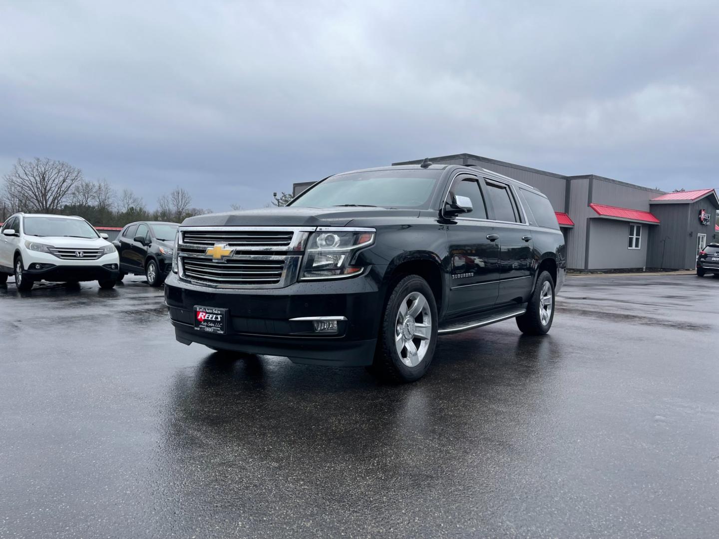 2016 Black /Brown Chevrolet Suburban LTZ 4WD (1GNSKJKC3GR) with an 5.3L V8 OHV 16V engine, 6A transmission, located at 11115 Chardon Rd. , Chardon, OH, 44024, (440) 214-9705, 41.580246, -81.241943 - Photo#0